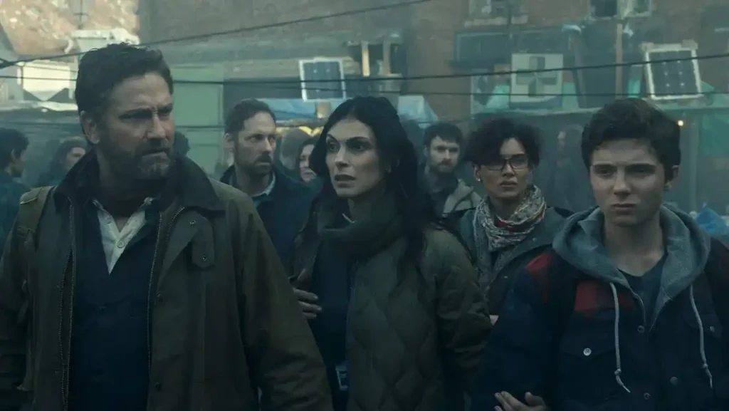 Gerard Butler, Morena Baccarin, and Roman Griffin Davis in Greenland 2: Migration