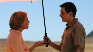 Rhea Seehorn and Carlos-Manuel Vesga in Pluribus